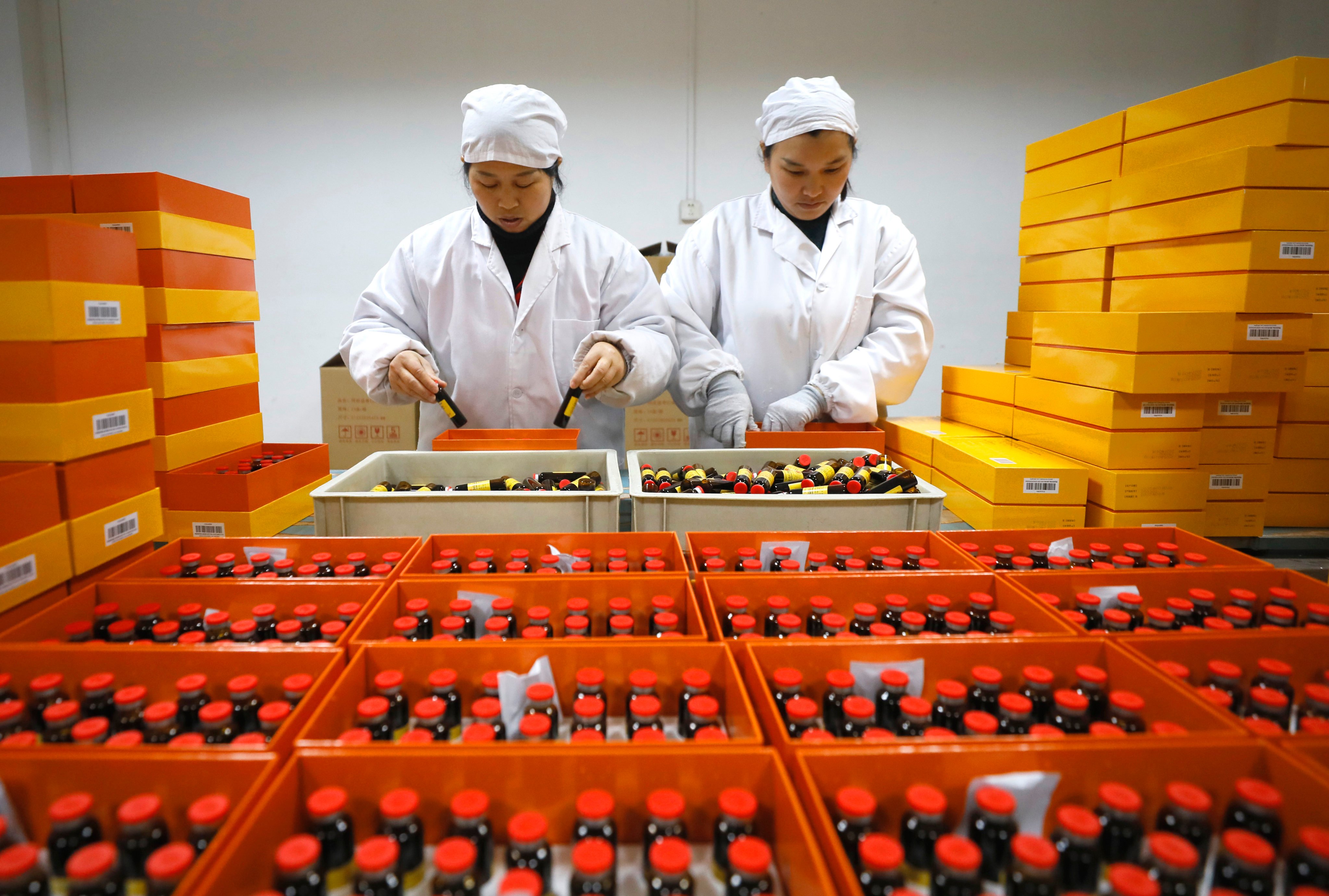 Employees of Jiangxi Banbiantian Pharmaceutical pack medicines at the company’s plant in Jiangxi province. Photo: VCG via Getty Images