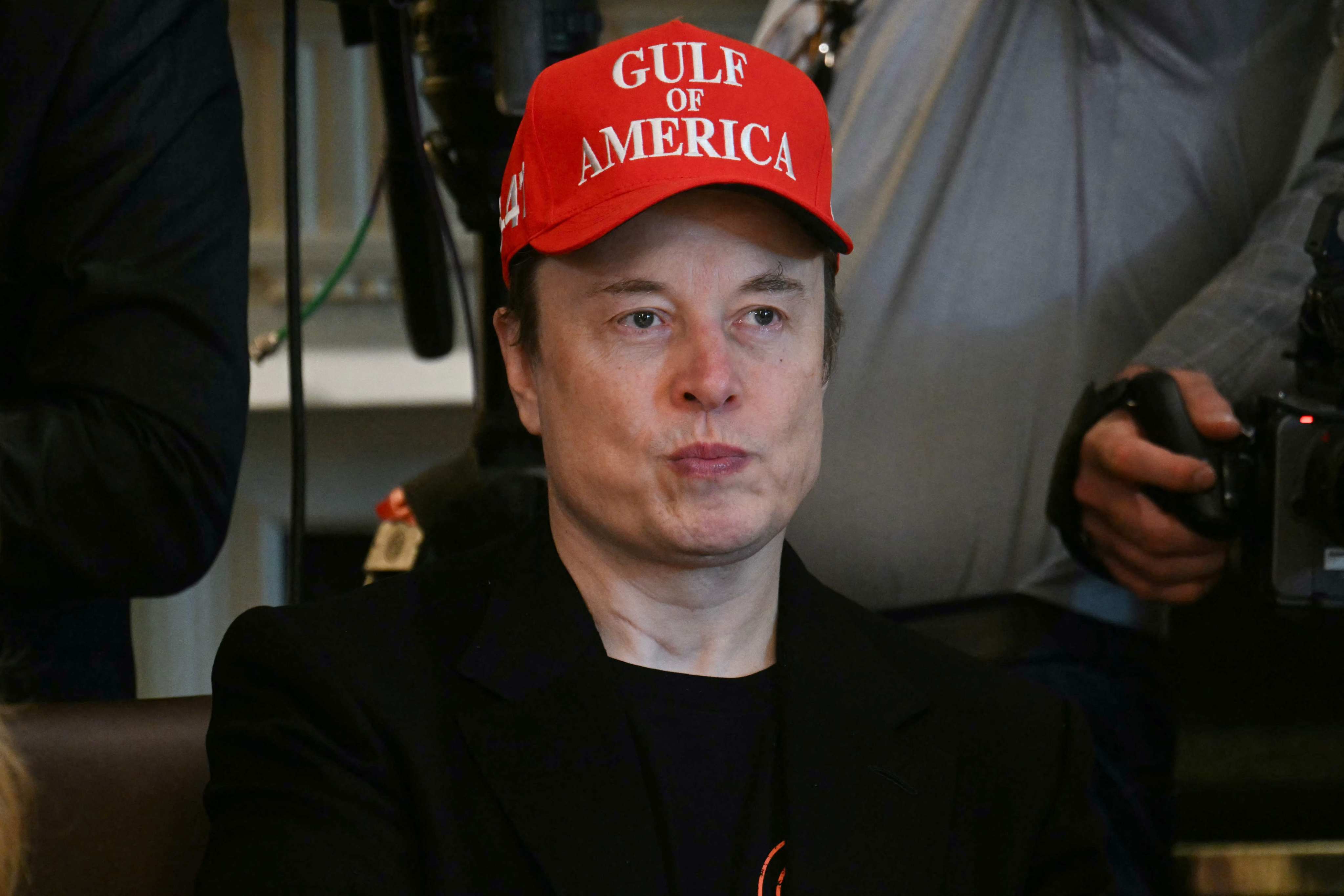 Elon Musk looks on during a cabinet meeting at the White House in April. Photo: AFP