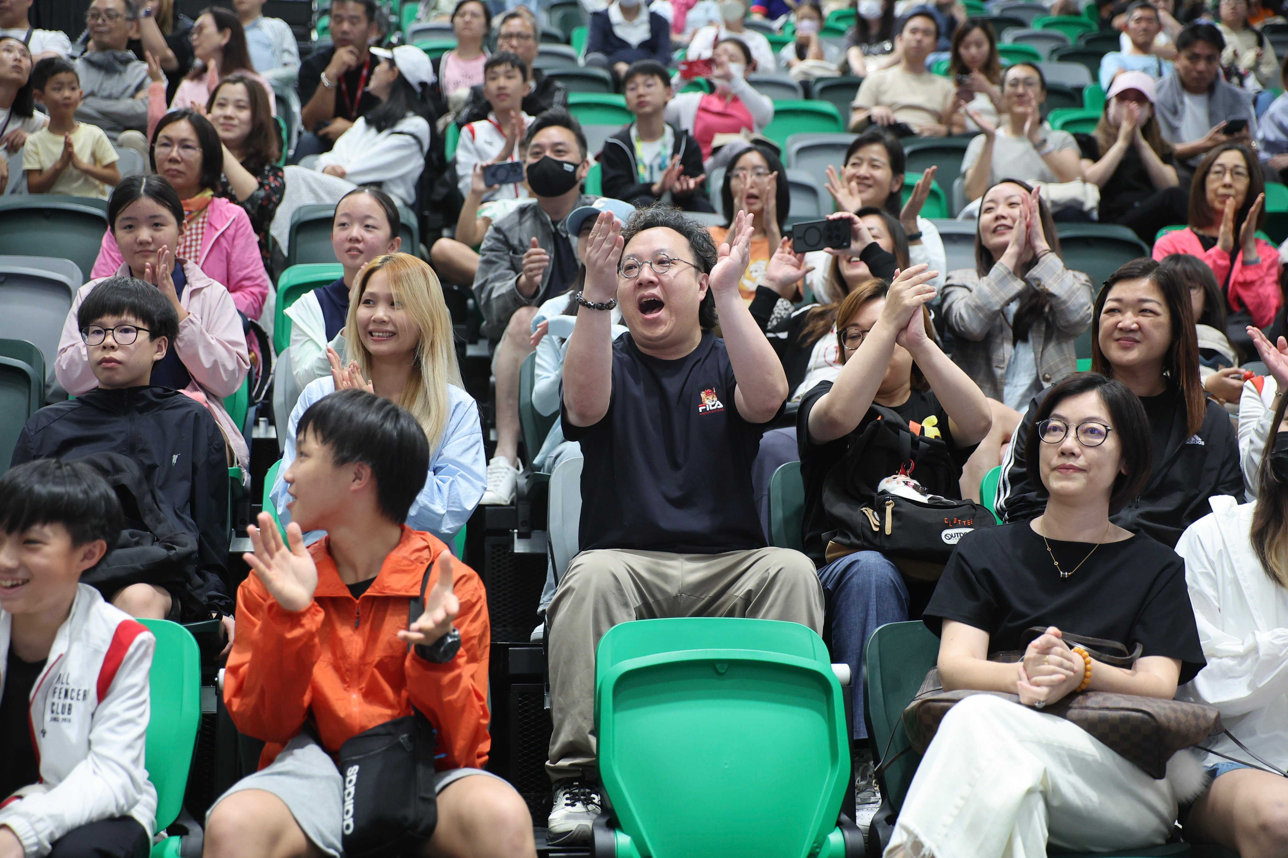 Spectators cheer at the 15th National Games fencing test event, held at Kai Tak Arena’s Sports Hall on June 1. Photo: Edmond So