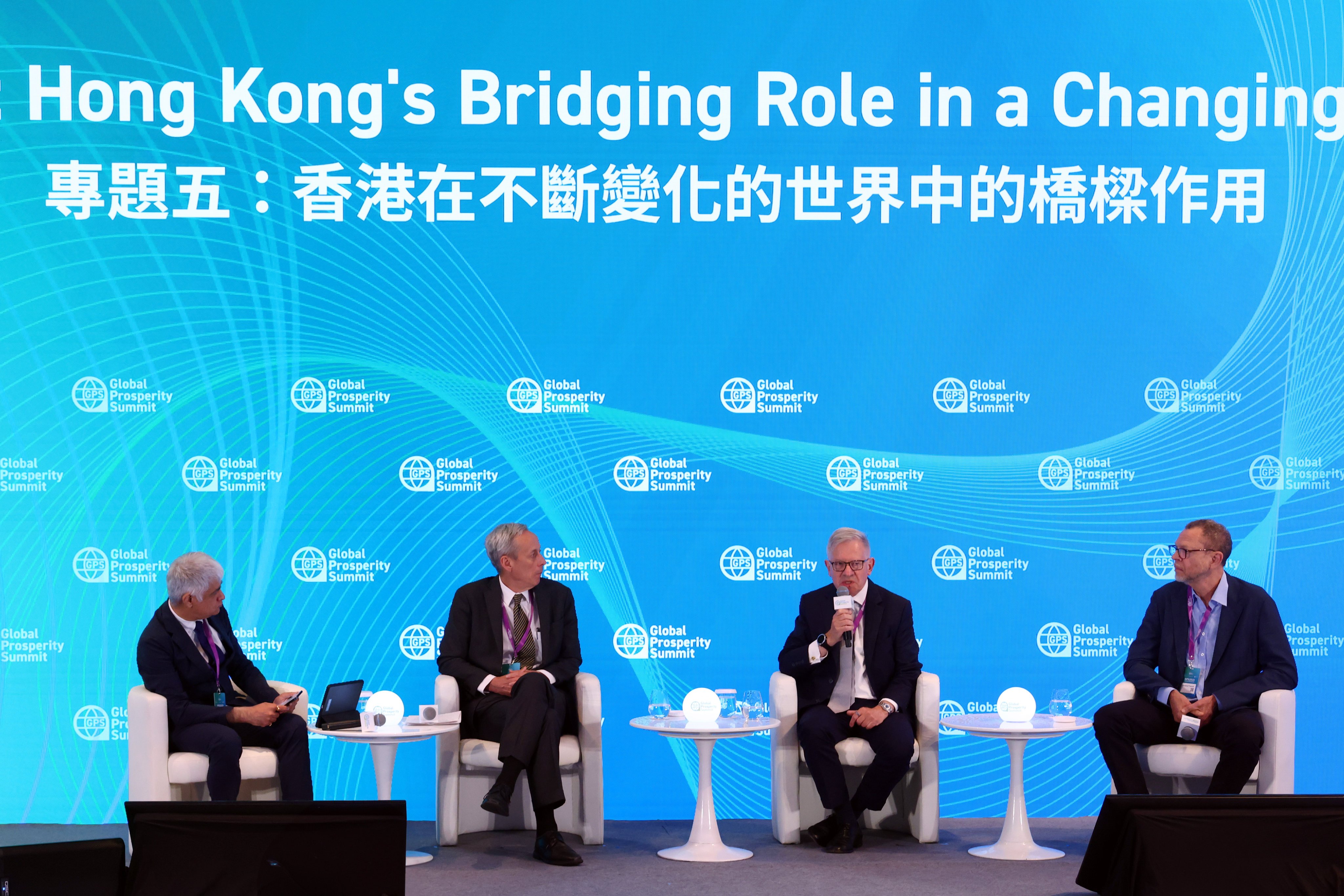 (From left) Vikram Channa, vice-president and head of content and products, Greater China and Southeast Asia, at Warner Bros Discovery, Craig Allen, former president of the US-China Business Council and senior counsellor at The Cohen Group, Sherard Cowper-Coles, chairman of the China-Britain Business Council and senior adviser to the group for HSBC Holdings, and Howard French, professor of journalism at the Columbia Journalism School of Columbia University, offer insights at a panel discussion of the Global Prosperity Summit 2025.