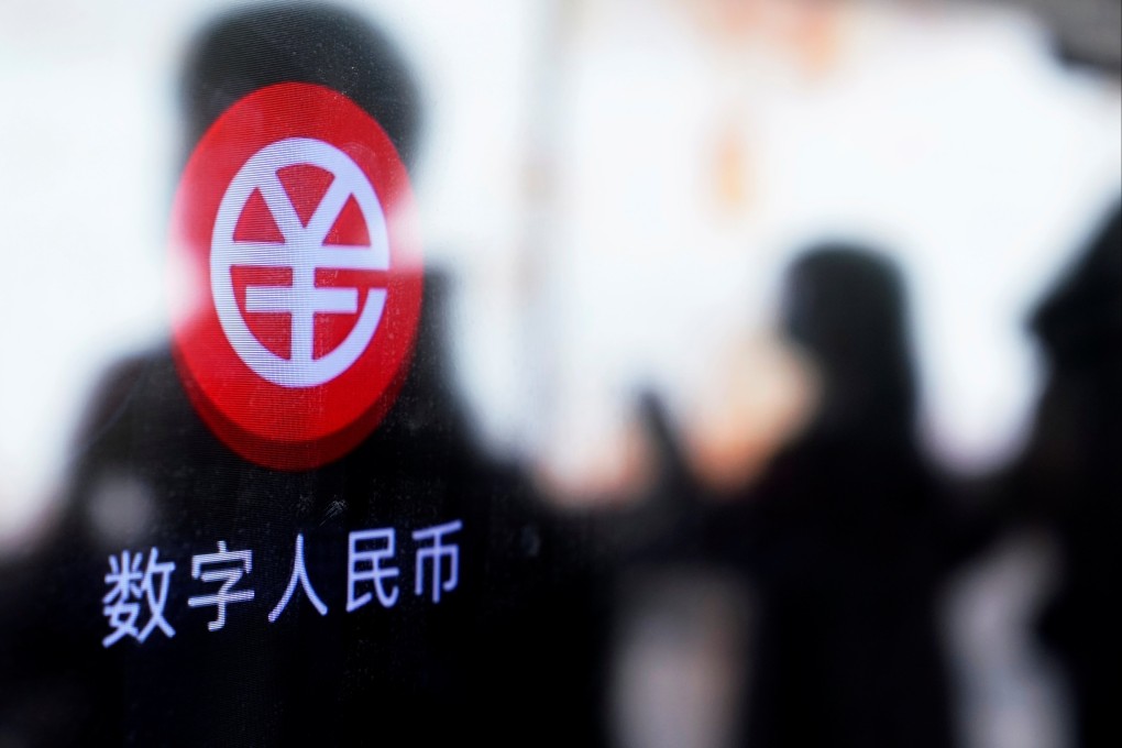 A sign for the digital yuan is seen on a vending machine at a subway station in Shanghai on April 21. Photo: Reuters